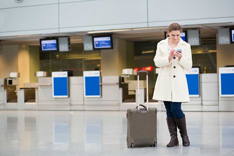 Lady on phone at Airport