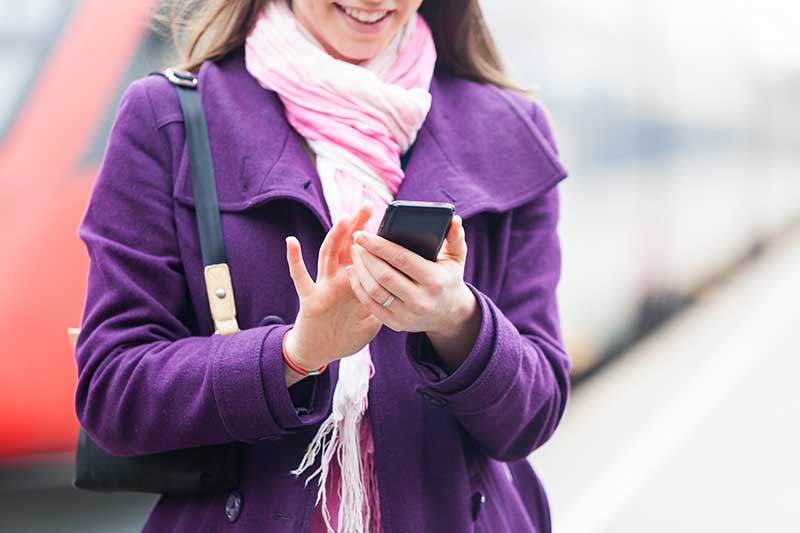 Lady travelling with phone